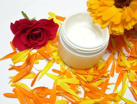 Hand-made beauty cream with flowers (rose and calendula)