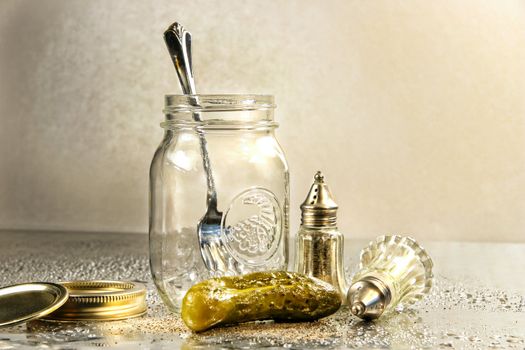Pickle with a jar and antique salt and pepper shakers