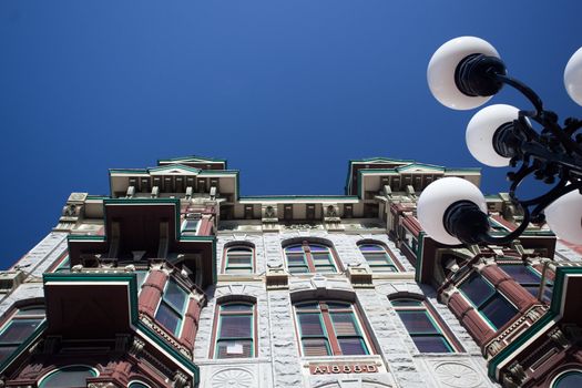 Gaslamp district of San Diego with the old Louis Bank of Commerce building set by ornate gas lamps