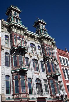 Gaslamp district of San Diego with the old Louis Bank of Commerce building set by ornate gas lamps