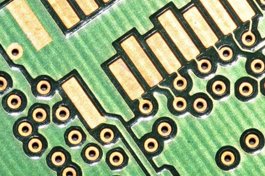 A close-up macro shot of a small computer board for background.