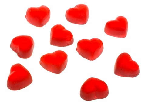 ten heart shaped fruit jellies, located on circle, isolated on white