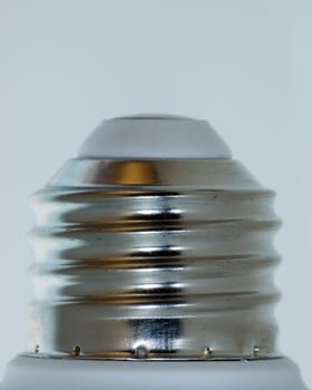 The screw on end of a light bulb.