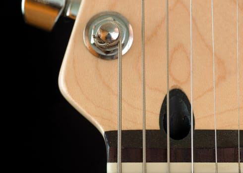 A section of an electric guitar neck.