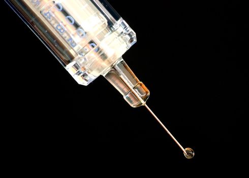 A close-up shot of a hypodermic needle.