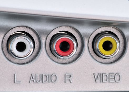 Close-up shot of audio and video jacks.