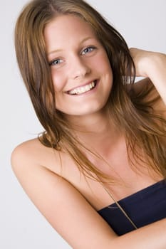 Portrait of young beautiful teenage girl smiling 