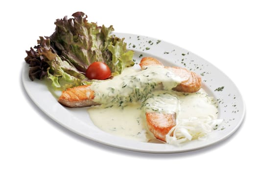 Baked salmon with spinach and vegetables. White isolated, path.