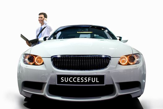 Young businessman by modern white car on white isolated