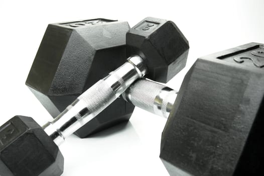 Weight lifting dumbbells isolated against a white background