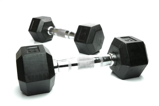 Weight lifting dumbbells isolated against a white background