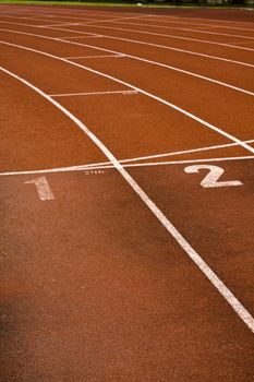 Running lanes on a track in play gorund 