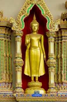 a golden buddha at wat plai laem in koh samui, thailand