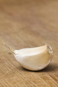 Garlic on a wooden cutting table