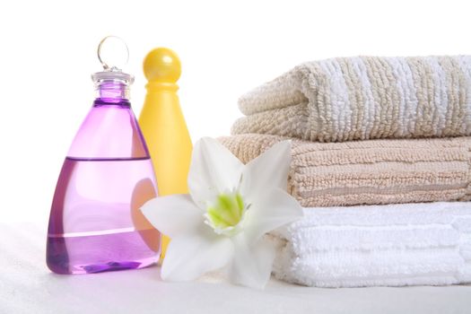 hygienic still-life, aromatic oil, shampoo and towel, aromatic therapy