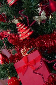 Red box hanging on Christmas tree