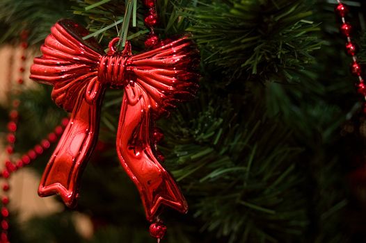 red bow as christmas decoration on tree