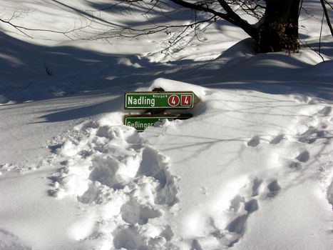 Sign almost vanished in high snow cover in Bayeria