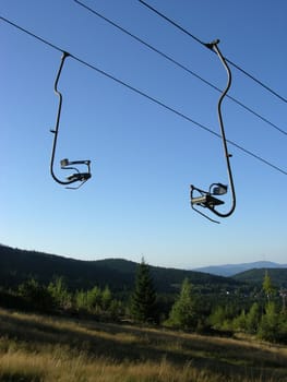 Chair-lift and the blue sky