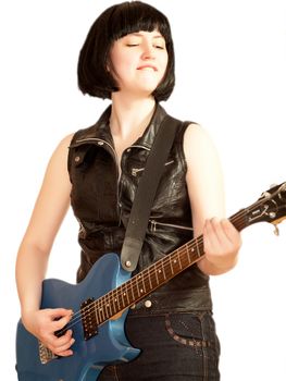 Young woman plays on a electric guitar, isolated
