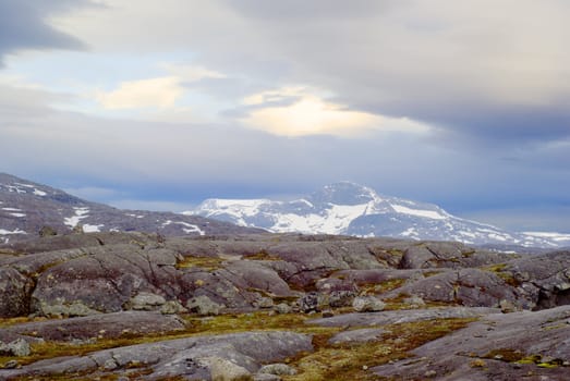 Beautiful mountain landscape with the cloudy sky