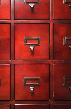 Lustrous Wooden Card File Cabinet in Dramatic LIght