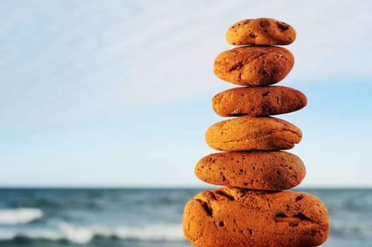 Horizontal image of red stones in the beach