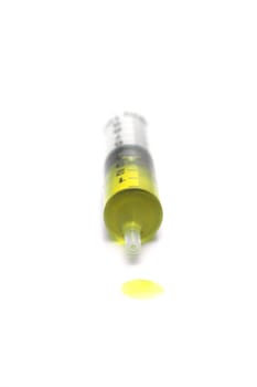 A syringe isolated against a white background