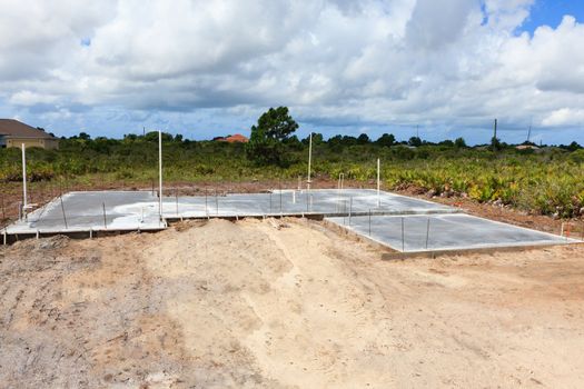 Cement foundation with plumbing through the floor