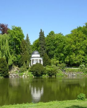 Ancient pavilion in a magnificent park scenery