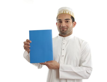 An arab italian mixed race businessman wearing traditional clothing is holding a booklet, message or brochure.  White background.