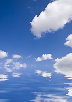 Clouds reflected in calm ocean water
