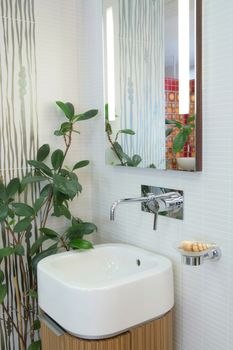 fragment of the interior bathroom with delftware sink for washing