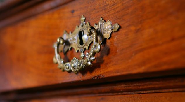 fragment to old-time furniture, Vintage, chest of drawers, Effect "Small Depth to Sharpness"