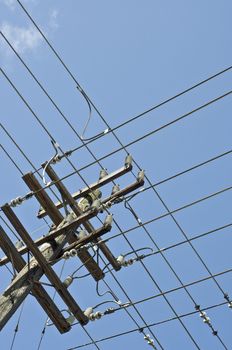 grid of power lines on pole