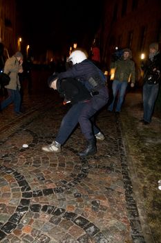 Agresive crowd and police near Latvian Parliament. Riga, Latvia, January 13, 2009