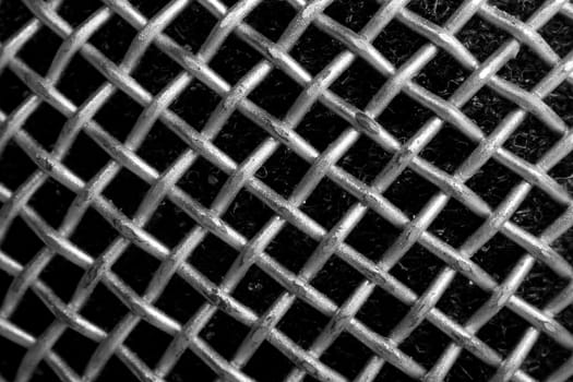 texture of close-up silver microphone wire netting