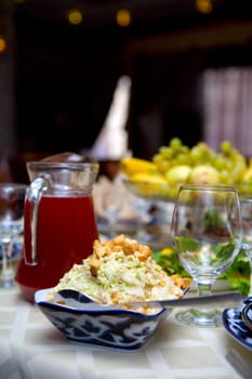 Restaurant table with snacks and beverages on it 