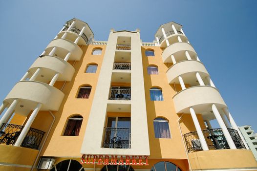 Hotel and clear blue sky