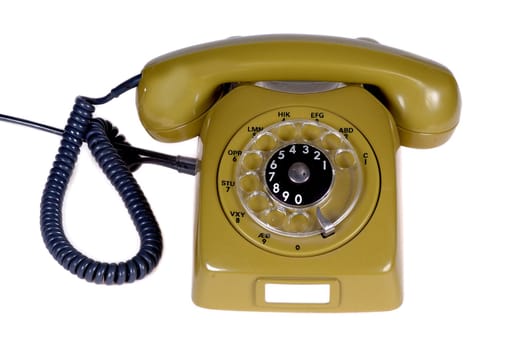 Green telephone. The telephoe was taken in studio on a clean white background.