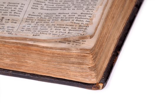 Old bible, over 100 years old, taken on clean white background.