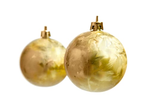 Two golden Christmas balls isolated on white