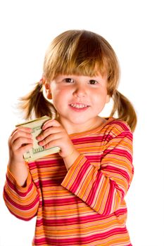 Girl holding bunch of dollars as her first salary isolated on white