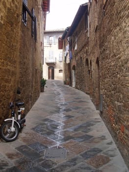 Passageway and bike in Tuscany Italy