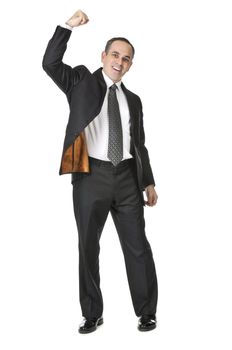 Triumphant businessman in a suit isolated on white background