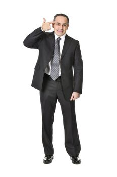 Businessman in a suit gesturing suicide isolated on white background