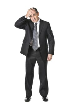 Upset businessman in a suit isolated on white background