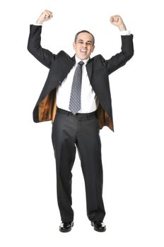 Triumphant businessman in a suit isolated on white background