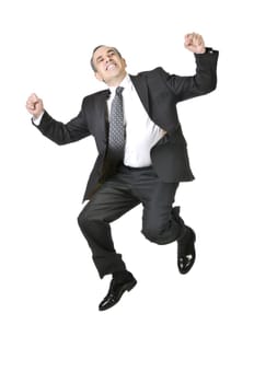 Jumping businessman in a suit isolated on white background