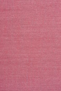 magenta textile background from a vintage book cover